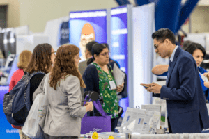 Exhibitors and Attendees in the ASHG Exhibits Hall