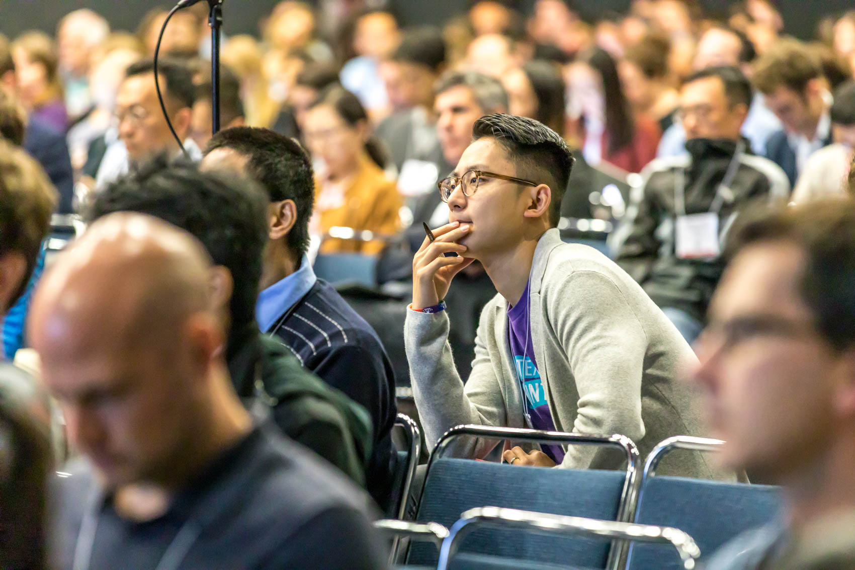 Attendee listening in on a plenary