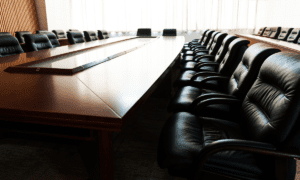 Conference table and chairs in modern meeting room